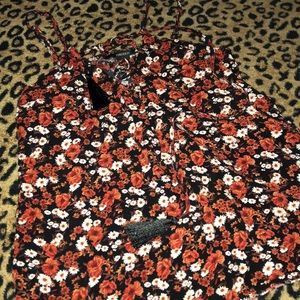 Cute colored floral shirt with tie up.